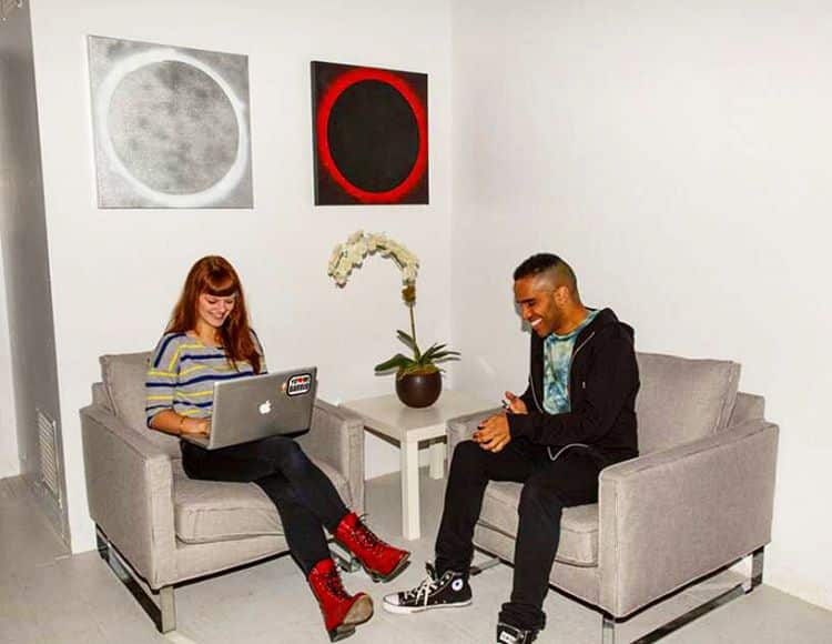 two freelancers talking about work at the harlem collective