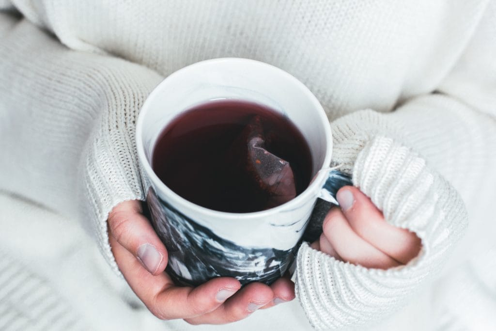 a cup of coffee in a employees workplace