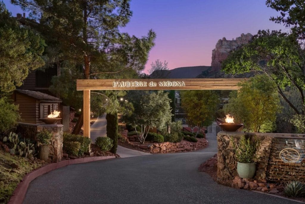 The Sedona Resort entrance at twilight, featuring soft lighting and a romantic atmosphere ideal for wedding celebrations.
