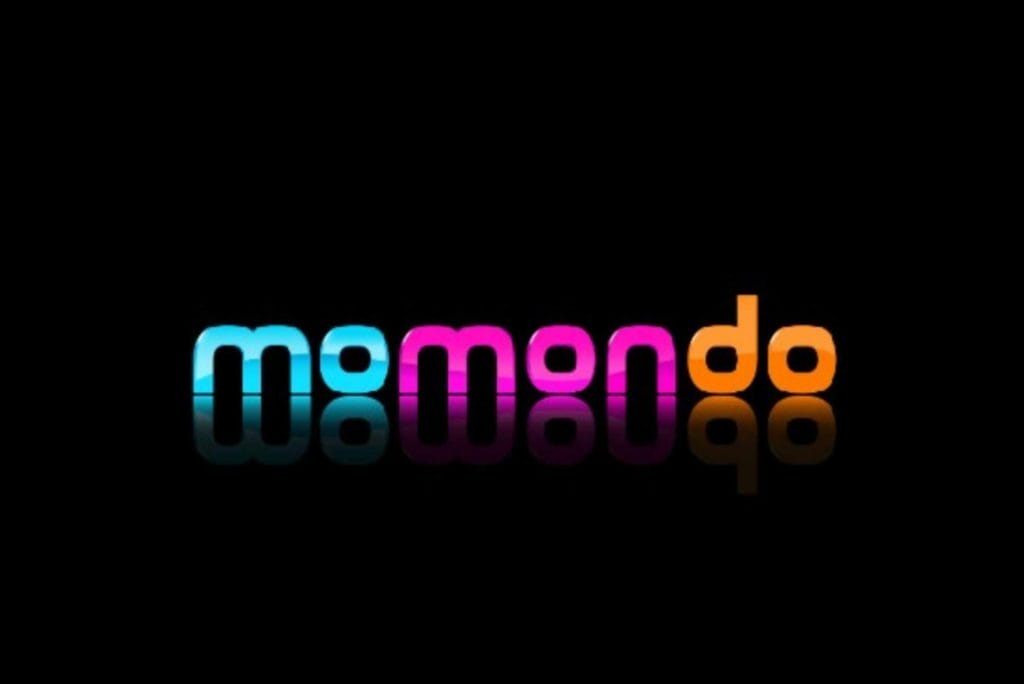 Neon lights display the word "momondo," representing a popular platform for booking affordable flights globally.