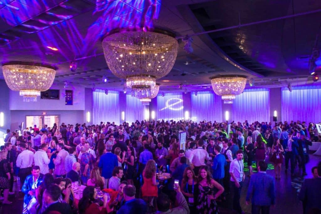A large gathering of guests celebrating at the Miami Emanuel Luxury Venue, highlighting the energy of the event.