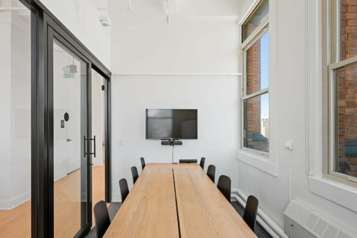 Conference room at 166 Geary, San Francisco, showcasing a table and chairs, ideal for professional gatherings.